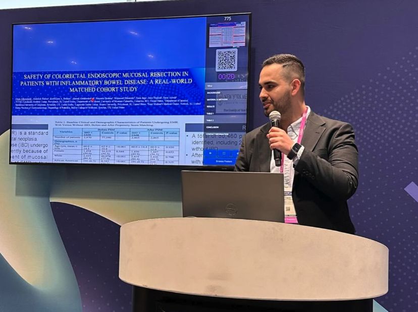 Omar Alkasabrah presenting his work on endoscopic mucosal resection in inflammatory bowel disease at DDW 2026