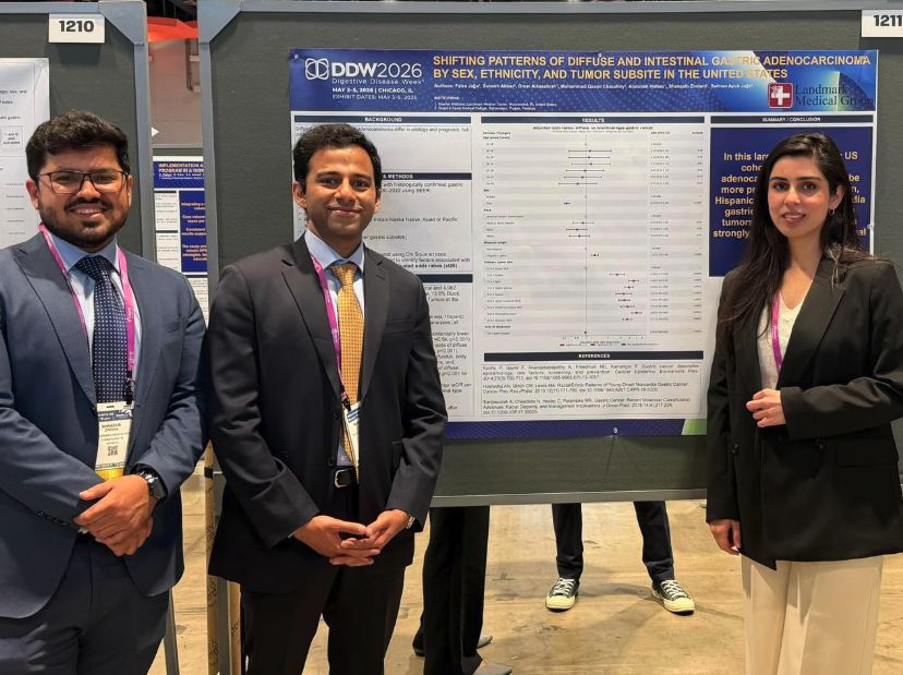 Shahzaib Zindani and Faiza Jajja presenting their poster on gastric adenocarcinoma patterns at DDW 2026